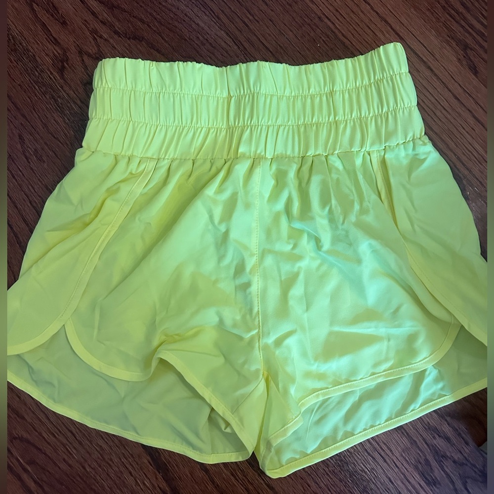 Pink lily at athletic shorts